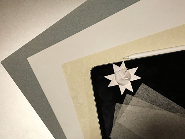 iPad Pro and paper sheets​